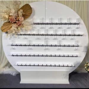 a white display with many glasses on it