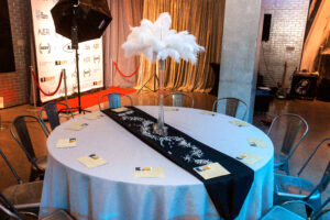 a round table with a black and white table runner