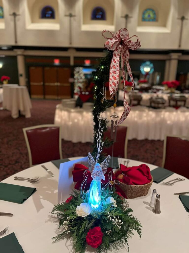 a centerpiece on top of a table in a banquet hall