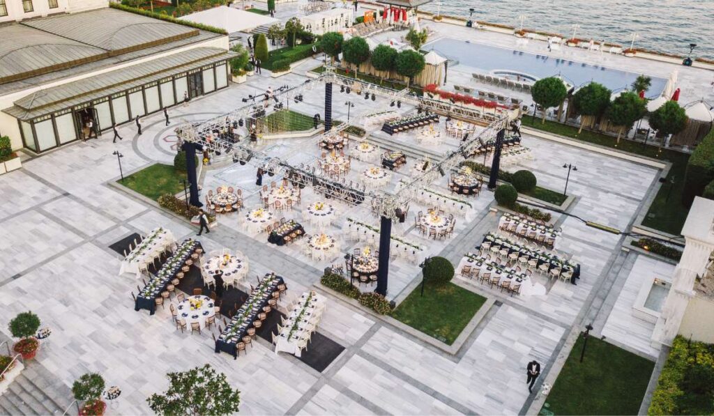 an aerial view of a wedding venue with tables and chairs