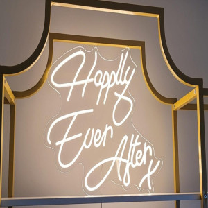 a lighted sign that says happily ever after
