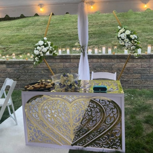 a table set up for a wedding under a tent