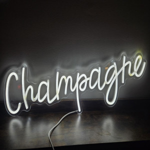 a neon sign that says champagne on it