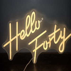 a neon sign that says hello forty