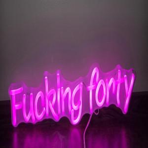 a neon sign that says fucking forty
