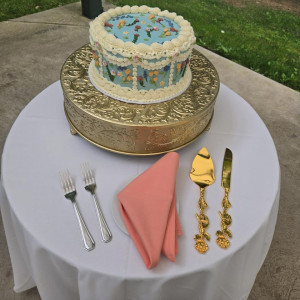 a cake sitting on top of a white table