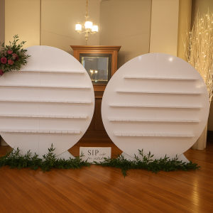 a couple of large white circles sitting on top of a wooden floor