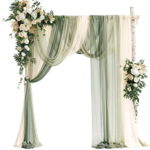 a wedding arch decorated with flowers and greenery