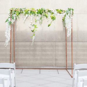 a couple of white chairs sitting next to each other