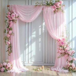 a pink wedding arch decorated with flowers and candles