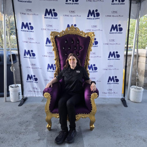 Purple and gold velvet throne chair with ornate gold frame used as royal seating at a luxury event in Pittsburgh