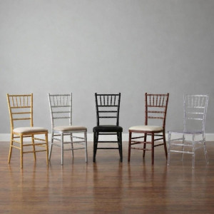 a row of chairs sitting on top of a hard wood floor