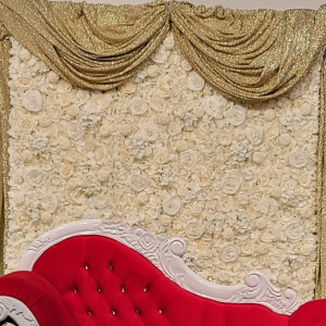 a red and white bed sitting in front of a window