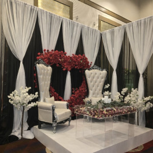 a white table topped with lots of white flowers