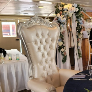 White pearl leather throne chair with silver trim used as luxury focal seating at an upscale event in Pittsburgh