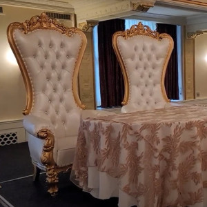 White pearl leather throne chair with gold trim used as luxury royal seating at an upscale Pittsburgh event