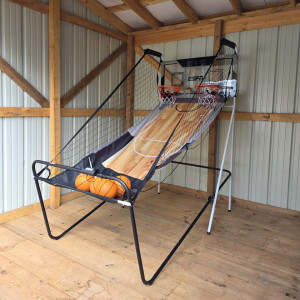 ESPN Basketball Pro arcade game with dual hoops and digital scoreboard used for interactive entertainment at a Pittsburgh event Pop A Shot