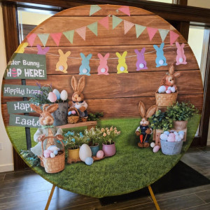 Easter theme spandex backdrop cover on Luna Circle Arch, charming spring design with bunnies Easter eggs and pastel bunting for Easter parties and spring events in Pittsburgh PA, Event Rentals of Pittsburgh