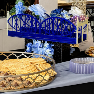 Smithfield Street Bridge 3D printed navy blue cookie table rental for Pittsburgh wedding cookie table displays with blue hydrangea florals, Event Rentals of Pittsburgh