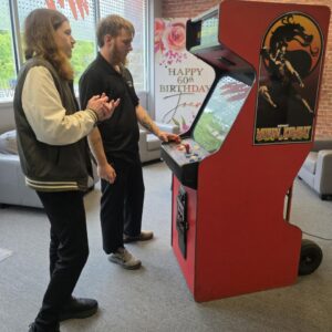 Original Mortal Kombat 2 arcade cabinet rental with custom artwork at a birthday party in Cranberry Township PA, retro arcade game rental for corporate events weddings and parties, Event Rentals of Pittsburgh